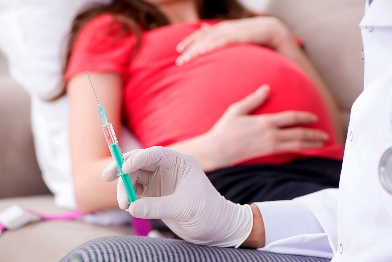 Pregnant Woman Getting A Flu Shot