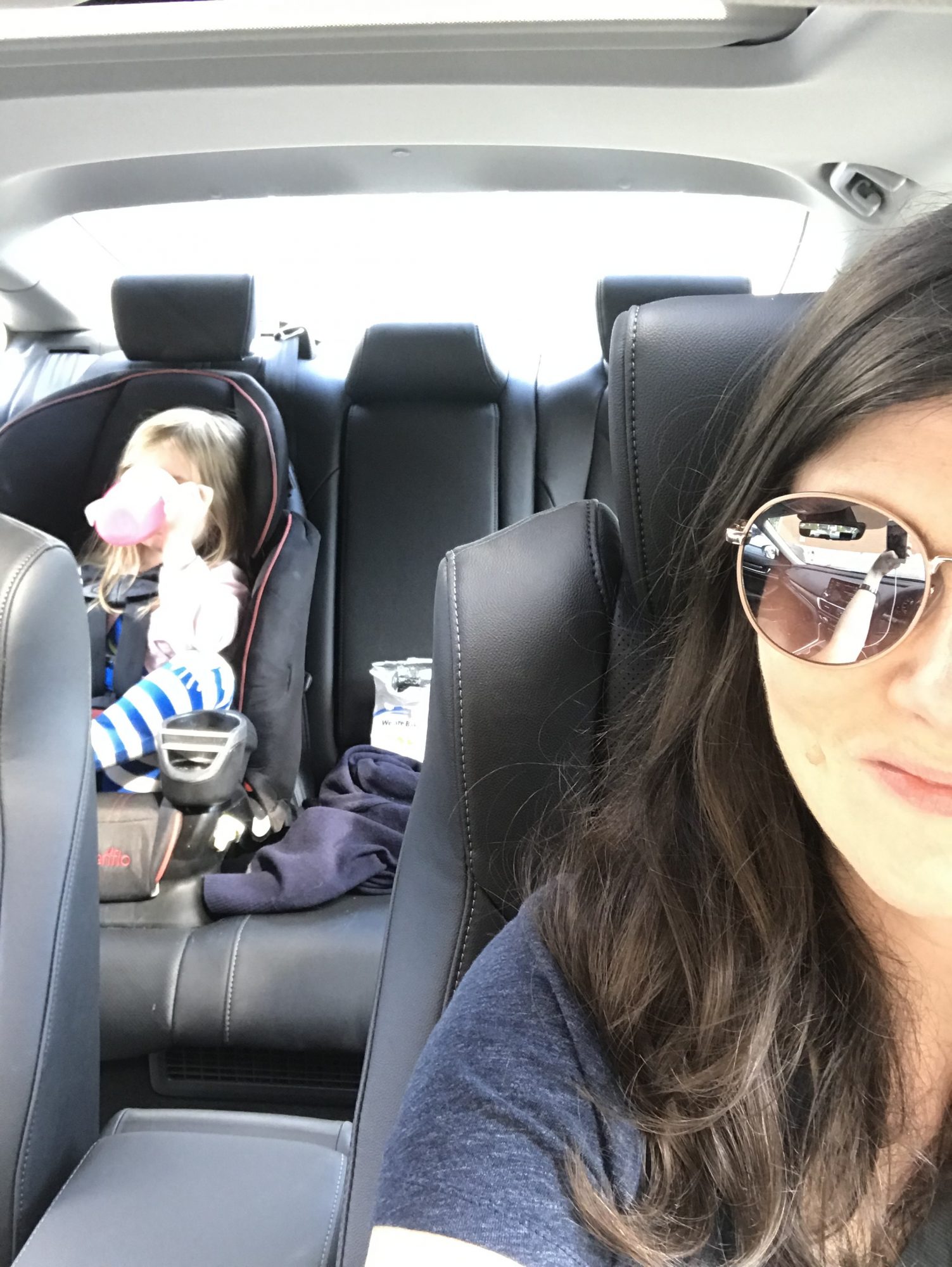 Julia Dennison and Daughter Esme in Ford Car