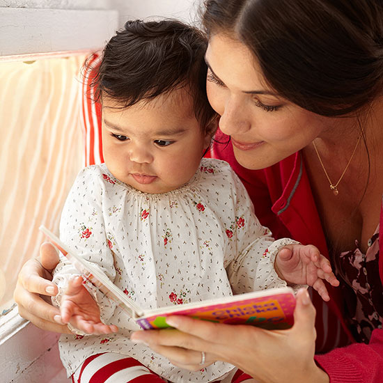 Mom reading with baby