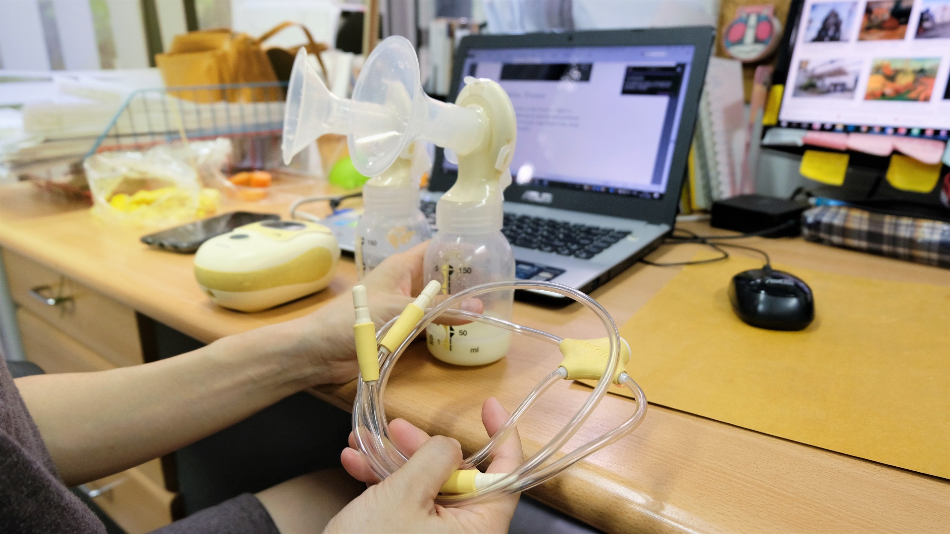 Woman Breast Pump At Work Office Desk